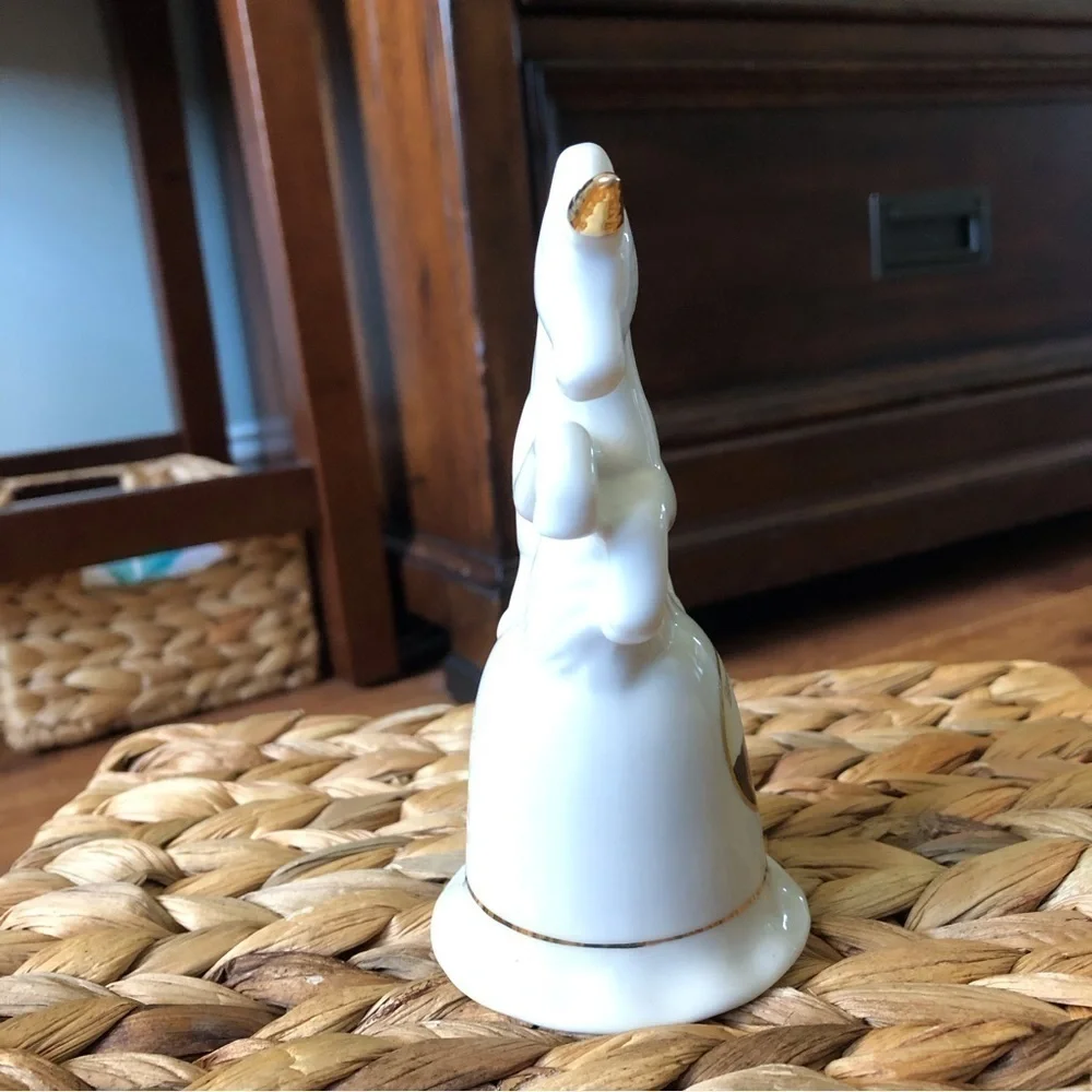 White ceramic Blowing Rock unicorn bell